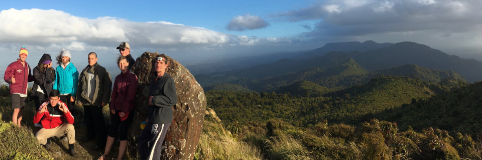 Hikers enjoying one of the vistas on a High Ground hike
